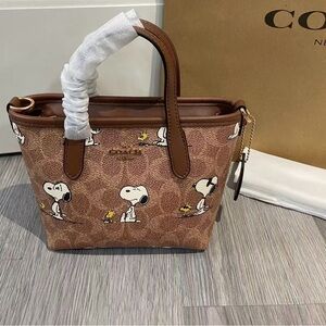 Coach X Peanuts City Mini Tote Bag In Signature Canvas With Snoopy Print